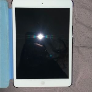 iPad mini with blue magnetic cover and case